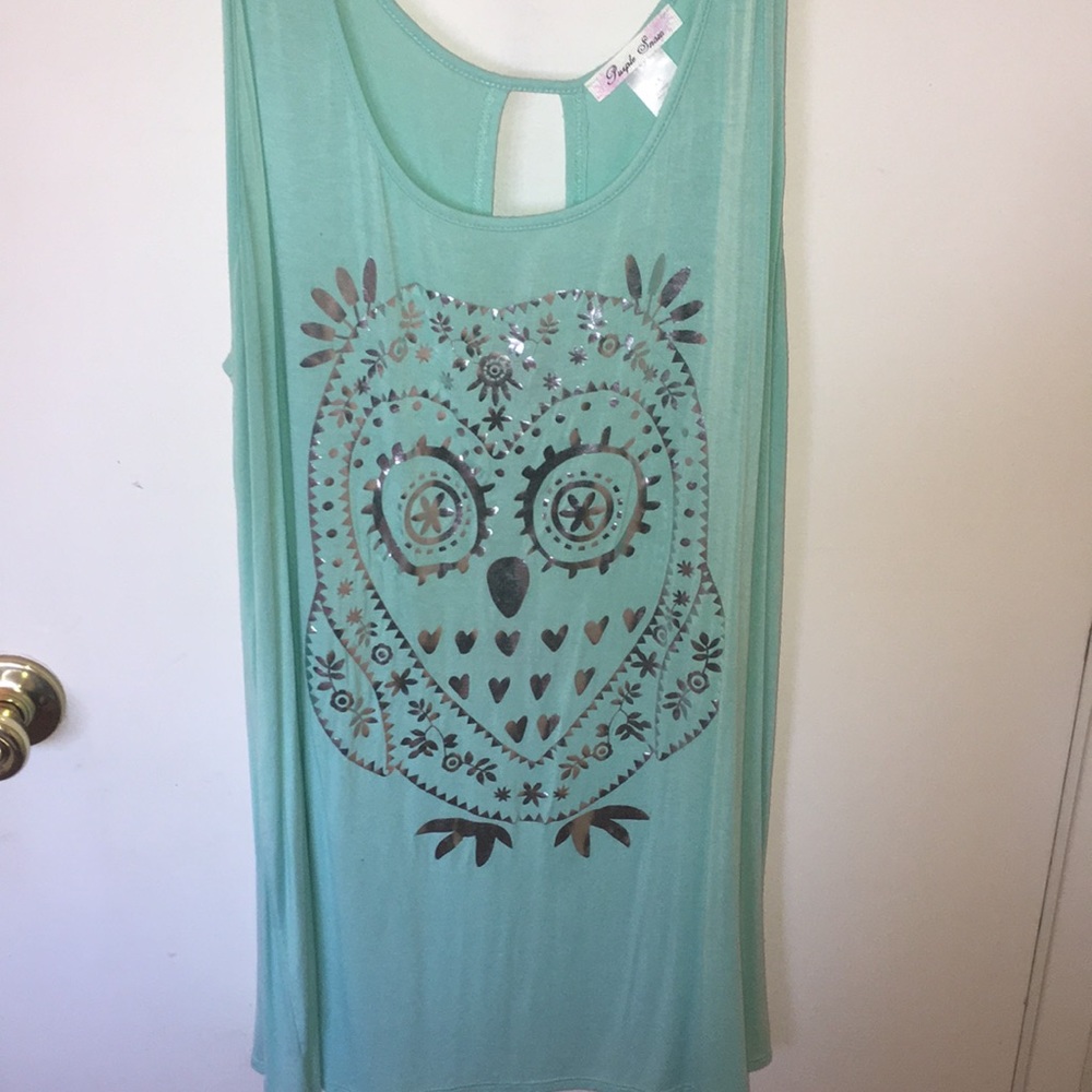 Sleeveless turquoise top with owl print